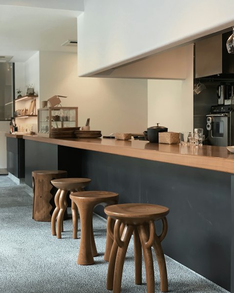 Sculpted Wooden Stool, Looped Legs